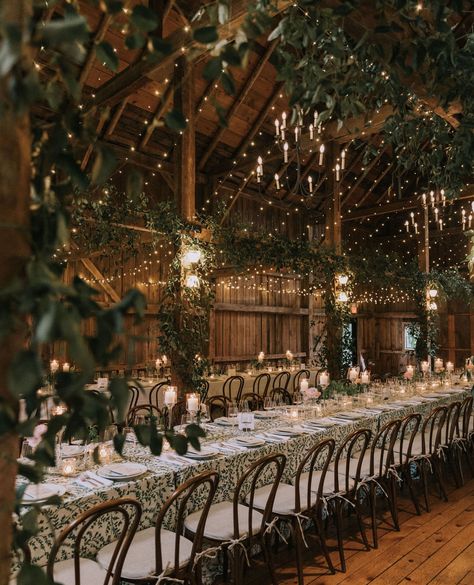 With abundant greenery and BBJ La Tavola linens to echo the garden vibes, this romantic barn wedding created an elegant and enchanted space from every possible angle⁠ ⁠ S&R⁠ Planning, Design & Florals @lanitoscanodesign⁠ Photo @courtney_elizabeth_media⁠ Rentals @onestopeventrentals @heartwoodessentials @bbjlatavola⁠ Lighting @griffingriffinlighting⁠  #barnwedding #mainewedding #weddinginspo #wedding #outdoorwedding #maine #newenglandwedding #weddinginspiration #farmwedding #greenery Romantic Barn Wedding, Nordic Wedding, Greenery Wedding Decor, Forest Theme Wedding, Barn Wedding Reception, Cabin Wedding, Barn Wedding Decorations, Dream Wedding Decorations, Woodsy Wedding