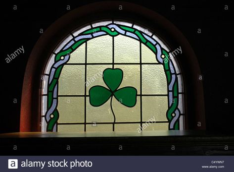 Download this stock image: A stained glass window with a shamrock in an Irish pub in Donegal - C4YWN7 from Alamy's library of millions of high resolution stock photos, illustrations and vectors. Irish Stained Glass Windows, Irish Bar, Rustic Pergola, Round Window, Pub Interior, Stained Glass Window Hanging, Pub Signs, Irish Pub, Window Hanging