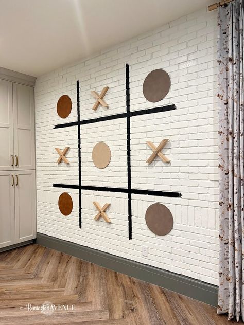 Interactive Art Wall Office, Vintage Industrial Game Room, Giant Wall Games, Apartment Clubhouse Design Interiors, Teen Center Ideas, Interactive Wall Design, Youth Room Ideas, Game Room Paint Ideas, Giant Tic Tac Toe