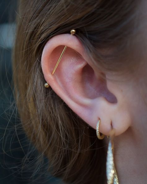 3 ear piercings