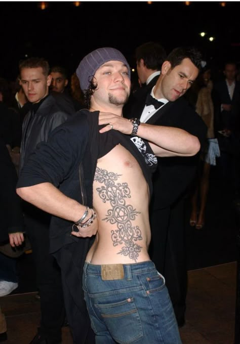 Tramp Stamp On Men, Hip Tattoo Men, Men’s Tramp Stamp, Male Tramp Stamp, Jonathan Davis Tramp Stamp, Bam Margera 2000s Outfits, Bam Margera Tattoos, Bam Margera 2000s, Bam Margera