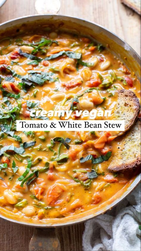 The comforting flavors of this Creamy Tomato White Bean Stew make the perfect easy lunch or dinner. This plant-based recipe is packed with wholesome ingredients, like protein-packed white beans, cherry tomatoes, and nutrient-dense greens. Learn how to make this easy and satisfying vegan stew in just 25 minutes. Tomato White Bean, White Bean Stew, Vegan Stew, Plant Based Diet Recipes, Vegan Soup Recipes, Bean Stew, Tasty Vegetarian Recipes, Vegan Soups, Easy Lunch