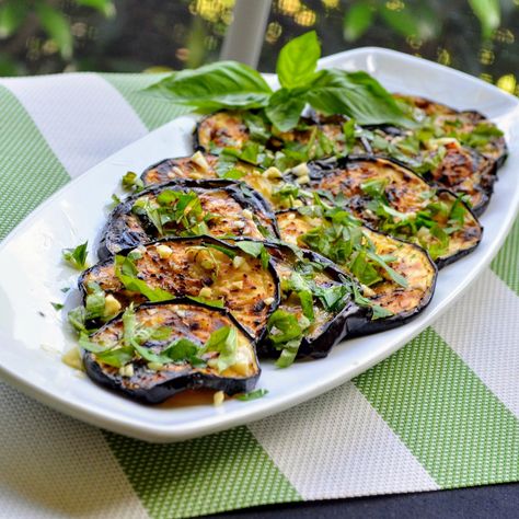 Eggplant is grilled with basil and parsley for this super easy Italian side dish! You can also serve this as a vegan appetizer. Works with zucchini as well. Italian Eggplant Recipes, Grilled Eggplant Recipes, Italian Side Dishes, Grilled Side Dishes, Easy Summer Side Dishes, Italian Dinner Party, Italian Night, Italian Party, Grilling Sides