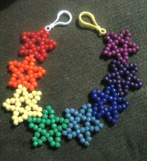 rainbow star belt chain How To Make A Star Out Of Beads, Belt Chain Diy, Perler Belt Chain, Rainbow Kandi, Kandi Pant Chain, Kandi Chain, Kandi Star Pattern, Kandi Star Tutorial, Kandi Belt