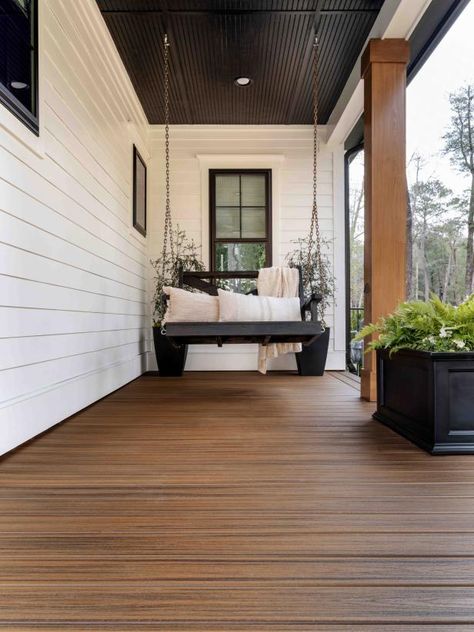 Pictures of the HGTV Smart Home 2022 Front Yard | HGTV Smart Home 2022 | HGTV Farmhouse Modern Front Porch, White House With Wood Accents Exterior, Front Yard Farmhouse, White House Front Porch, Composite Front Porch, Front Porch Ceiling Ideas, Front Porch Modern Farmhouse, Hgtv Smart Home 2022, Front Porch Remodel