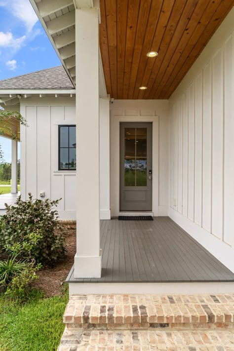 Tranquility Cottage Front Porch Materials, Board And Batten Front Porch, Front Porch Modern Ideas, White House With Stained Porch, Painted Columns On Front Porch, Front Porch Add On, White House Front Porch, Rectangle Front Porch Ideas, White Board And Batten Exterior Bungalow