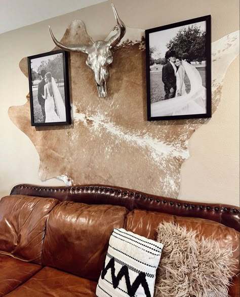 Elk Hide Decor Ideas, Western Home Wall Decor, Cowhide Wall Decor Bedroom, Cowhide Behind Bed On Wall, Long Horn Wall Decor Living Rooms, Rugs For Dark Grey Floors, Cowhide Hung On Wall, Steer Skull Decor Living Rooms, Ranch Style Office Decor