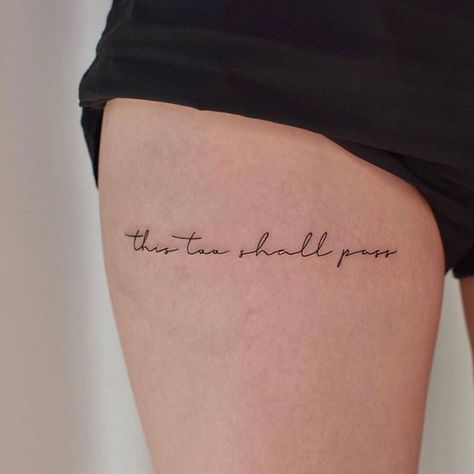 Frases para tatuajes | Tattoofilter Thigh Writting Tattoo, Text Tattoo On Thigh, Upper Knee Tattoo Women Quotes, Tattoo On Thigh For Women Quote, This Too Shall Pass Quote Tattoo Rib, Thigh Quotes Tattoos Women, Upper Thigh Quote Tattoo, Lettering Tattoo Ideas Women, Front Thigh Tattoos Quote