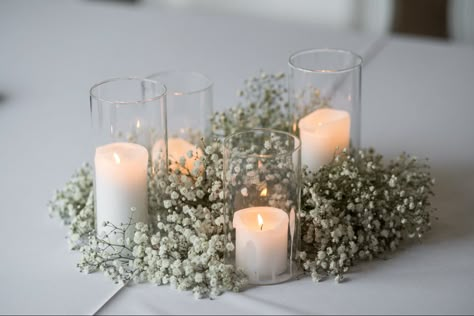 Baby’s breath and candle set provided by Okie Floral Co. Photo by @jagphotovideo in Tulsa, Ok. We are an Oklahoma-based floral design company. We love to travel though! Inquire today! Planning by XO EVENT CO. Baby Breath Center Piece Wedding, Centrepieces With Candles And Flowers, Simple Chic Centerpieces, Baby’s Breathe On Table, Babys Breath And Candles Centerpiece, Baby’s Breath Center Piece Simple, Low Centerpieces Wedding Round Table With Candles, Babys Breath Centre Piece, Baby’s Breath And White Rose Centerpieces