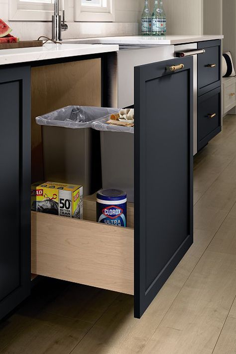 This pull-out waste bin fully extends for ease of removal. The storage compartment at the back keeps garbage bags close at hand. Organizing Ideas Pantry, Kitchen Garbage Can Storage, Pantry Organizing Ideas, Organization Ideas Pantry, Garbage Can Storage, Storage Organization Ideas, Kitchen Waste Bin, Modern Kitchen Remodel, Pantry Shelving