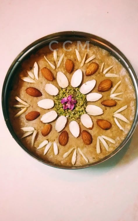 Sattu ,an indian mithai made of chickpea flour during the festival of teej Sattu Decoration Ideas, Matli Decoration, Annaprashan Decoration, Sattu Decoration, Dry Fruit Packaging, Ganpati Painting, Desserts Decoration, Nature Captions, Arti Thali