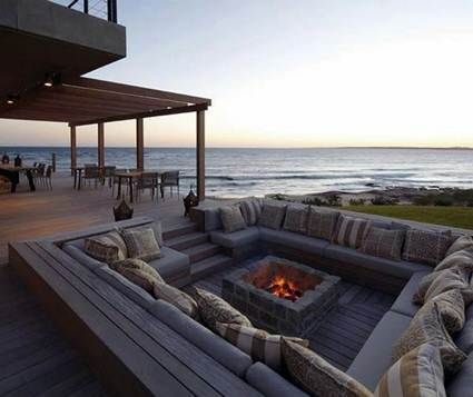 Awesome garden boma, sunken into the ground for extra effect & warmth (would love the sea background...hehehe). Sunken Fire Pits, Outdoor Seating Area, Design Hotel, Pool Spa, Style At Home, Outdoor Fire, Outdoor Fire Pit, Outdoor Rooms, Backyard Decor