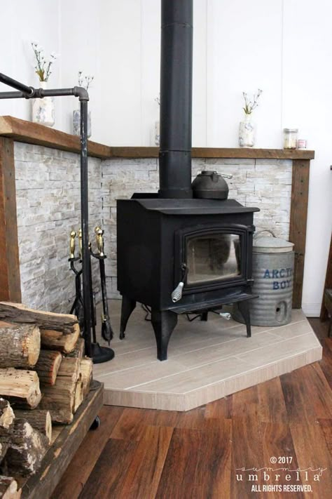 Do you desperately need a mantle update? I feel your pain! I was going through the same dilemma until I figured out how to do this easy DIY. Wood Stove Decor, Wood Burning Stove Corner, Corner Wood Stove, Wood Stove Surround, Corner Stove, Stove Decor, Wood Stove Hearth, Wood Stove Wall, Wood Burning Stoves Living Room