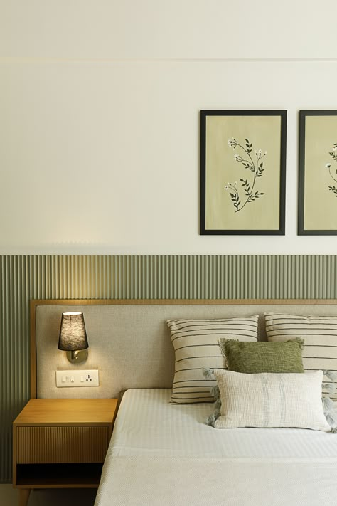 Parent’s Bedroom -This bedroom has a delicate fluted panel in moss green shade as a backdrop for bed and TV. The arched wardrobe and dressing panels in raw wooden textures allow it to blend seamlessly with the theme. The contrasting black linen lights on the headboard and long white curtains makes the room warm and cozy. Colour Palette Home Interior Design, Bedroom Headboard Design Modern, Minimalistic Interior Bedroom, Rooms Interior Bedroom, Bed Back Design Headboards, Colour Palette For Bedrooms, Parents Room Design, Headboard Design Modern, Headboard Design Modern Bedhead