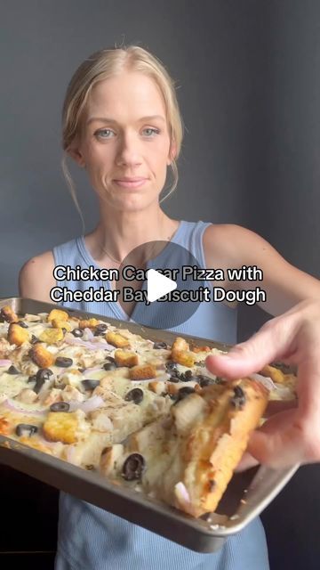 Andrea on Instagram: "✨Chicken Caesar Pizza With Cheddar Bay Biscuit Dough✨

Take one box of the cheddar bay biscuits dough and make the dough as the package says. Now take a sheet pan and spray oil on it. Put oil onto your hands then spread the dough out on the sheet pan. 

Bake at 425 degrees for about 10 minutes 

Now add your toppings. Take the garlic butter mixture from the cheddar bay biscuit dough box and make it up. Spread onto your crust with around a 1/2-3/4 cup of creamy Caesar dressing. Add 2 cups of cheese I did one cup of Italian style cheese and one cup of Monterey Jack. Add one cup of chopped cooked chicken 1/4 cup red onions sliced, 1/2 cup of black olives and 1/2 cup of croutons. Top with pepper.

Bake at 425 for 8-10 minutes. I broiled mine a couple minutes at the end. Caesar Pizza, Creamy Caesar Dressing, Dough Box, Cook Meat, Cheddar Bay Biscuits, Chicken Caesar, Biscuit Dough, Caesar Dressing, Black Olives