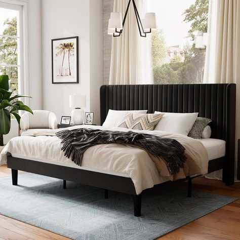 The bed frame is beautifully upholstered in soft velvet and features a wingback headboard design, adding a stylish touch of glamour to any home decor. Modern Style Bed, Velvet Bed Frame, Black Bed Frame, Lit King Size, Black Headboard, King Size Bed Frame, Wingback Headboard, Queen Size Bed Frames, King Bed Frame