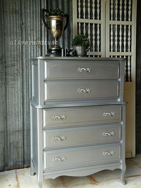 Metallic silver paint has a rich luster that looks expensive. Here are tutorials for shiny and aged silver paint looks. Painted furniture always looks great and I love these painted furniture ideas using silver paint. Not every shiny silver piece may fit in your home, but a beautifully aged piece might. See more on the blog for details. http://decoratedlife.com/how-to-paint-furniture-metallic-silver-paint-looks/?hvid=4mtQd0 The look is almost stainless steel. For the best result, prep, prep ... Rust Furniture, Silver Painted Furniture, French Provincial Dresser Makeover, Metallic Painted Furniture, Silver Dresser, French Provincial Dresser, Silver Furniture, Shabby Chic Dresser, Furniture Rehab