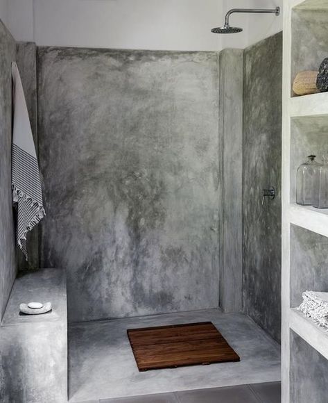 a modern industrial bathroom with concrete walls and a floor, a built in shelving unit and exposed pipes Concrete Theme Interior, Cement Interior Design, Cement Interior, Modern Industrial Bathroom, Industrial Bathroom Design, Cement Bathroom, Concrete Shower, Polished Cement, Bazaar Istanbul