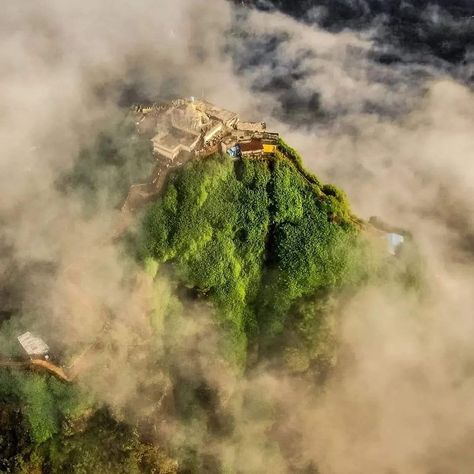 Climb to the summit of Adam's Peak and witness the beauty of Sri Lanka from above! Experience the magic of a sunrise hike and the spiritual significance of this iconic pilgrimage site. 🌄 #SriLanka #adamspeak #srilankatravel #trekking #sripadaya🙏 Sri Padaya, Adam's Peak Sri Lanka, Adams Peak, Sunrise Hike, Adam's Peak, Capsule Dressing, Sacred Mountain, Sri Lanka Travel, Buddhist Traditions