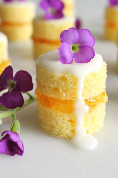 These mini naked cakes filled with sweet and tangy orange marmalade and garnished with fresh flowers are an elegant treat for a springtime brunch. They may look fancy, but they're simple to make. Afternoon Tea Recipes, Orange Marmalade, Tea Party Food, Naked Cakes, Afternoon Tea Parties, Tea Party Ideas, Tea Sandwiches, Fancy Desserts, A Piece Of Cake