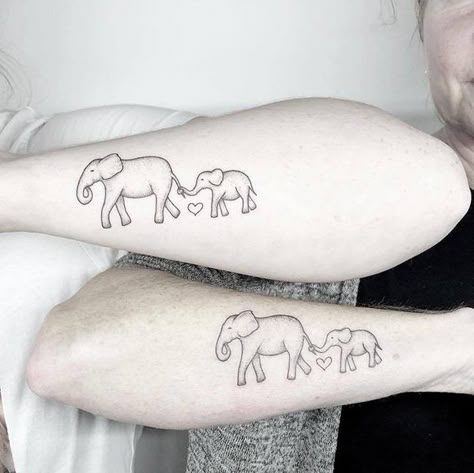 20 Meaningful Mother and Daughter Tattoos - The Trend Spotter Mother And Daughter Tattoo, Mum And Daughter Tattoo, Mother Daughter Tats, Children Tattoos, Connecting Tattoos, Mother And Baby Tattoo, Mother And Daughter Tattoos, Mommy Daughter Tattoos, Baby Elephant Tattoo