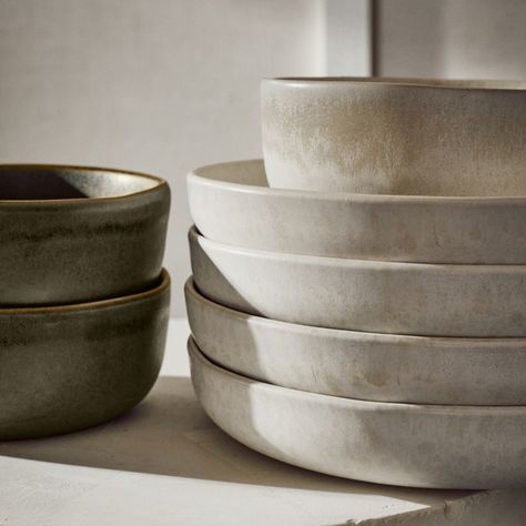 Expert craftsmanship leaves its mark on the Drift Pasta Bowl. Hand-pressed with a curved bottom and straight edges, wide stoneware form is coated with a matte ivory water-reactive glaze that behaves beautifully when kiln-fired. What surfaces is a subtle crackled texture in a rich tonal mix that makes each piece unique. Part of the Drift Reactive Ivory Dinnerware collection; also looks great with Drift Dinnerware in both lavender and green. CB2 exclusive.     Handmade  Stoneware  Matte ivory and West Elm Dinnerware, Stoneware Dinner Plates, Dish Ware Sets, Clay Pasta Bowl, Stoneware Serving Dishes, Mid Century Modern Dishware, Pottery Serving Bowls, Diningware Set, Pasta Bowls Pottery