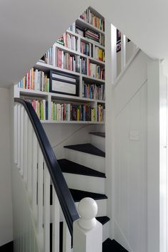 When your book collection threatens to take over the house, it’s time to tuck a bookshelf or two in an unusual place! Farmhouse Staircase Decor, Modern Farmhouse Staircase, Somerset Cottage, Farmhouse Staircase, Space Saving Staircase, Diy Staircase, Loft Stairs, Staircase Decor, Attic Renovation