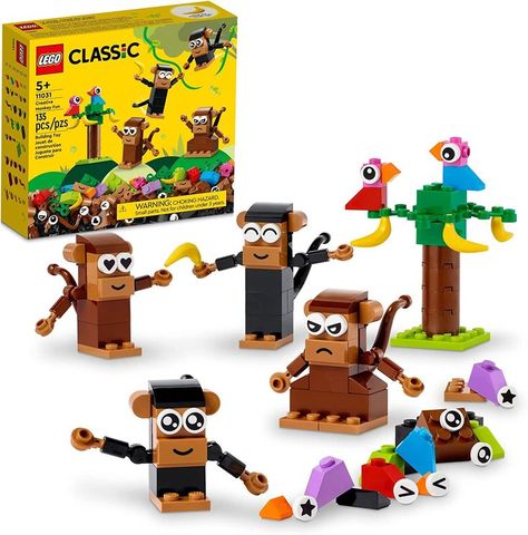 Jungle animal toy – LEGO Classic Creative Monkey Fun (11031) is packed with hands-on play possibilities to engage, entertain and inspire kids Ages 5 and up. Lovable characters – Kids assemble 4 monkeys using an assortment of bricks, expressive eye decorations and smile/frown tiles. The set also includes 4 bananas, 2 buildable birds and a buildable tree. Eye Decorations, Adult Lego, Best Lego Sets, Lego City Police, White Elephant Gift Ideas, Elephant Gift Ideas, Best White Elephant Gifts, Monkey Party, Monkey Gifts