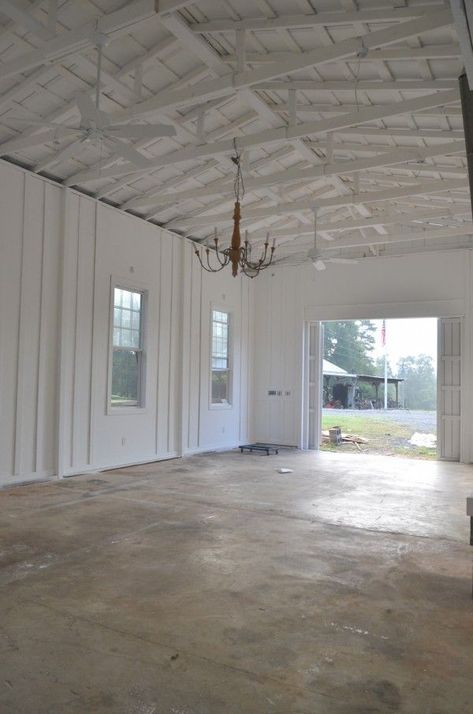 Board And Batten Garage Interior, Barn Walls Ideas, White Garage Interior, Farmhouse Garage Interior, Barn Ceiling Ideas, Pole Barn Interior Ideas, Pole Barn Interior, Painted Osb, Batten Walls