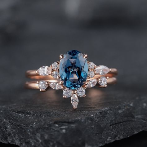 Gemstone can be replaced with other birthstones, if you would prefer a custom ring, please contact us. ★Description Main ring: *Center stone: 6X8mm Oval Cut London Blue Topaz *Accent stone: 0.2Ct Moissanite 5A Level, VS Clarity, CZ(Silver only) *Band Width(Bottom): 1.6-1.7mm Wedding band: V shaped classical band *Accent stone: 0.21Ct Moissanite 5A Level, VS Clarity, CZ(Silver only) Band width: 1.6-1.7mm This listing for alexandrite ring set: https://www.etsy.com/ShainGem/listing/1253422835/vinta Oval Ring Sets Wedding, December Birthstone Wedding Rings, London Blue Topaz Wedding Ring Set, Zircon Wedding Ring, Colored Wedding Rings Sapphire, December Engagement Ring, Wedding Ring With Blue Stone, Sapphire Wedding Rings Set, Blue Topaz Engagement Ring Vintage