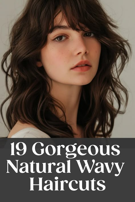 Portrait of a woman with natural wavy hair and bangs, with text "19 Gorgeous Natural Wavy Haircuts". Wavy Hair Mid Length Haircut, Wash And Wear Haircuts For Wavy Hair, Easy To Maintain Haircut, Natural Wavy Hair Cuts, Natural Wavy Haircuts, Haircuts For Naturally Wavy Hair, Naturally Wavy Hair Cuts, Shoulder Length Wavy Hair, Naturally Wavy Hair