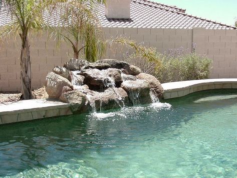 Diy Pool Waterfall How To Build, Waterfall Pool Ideas, Diy Pool Waterfall, Rock Waterfall Pool, Small Pool With Rock Waterfall, Adding Waterfall To Existing Pool, Pool Rock Waterfall, Jacuzzi Waterfall Into Pool, Rock Waterfall Pool Natural Stones