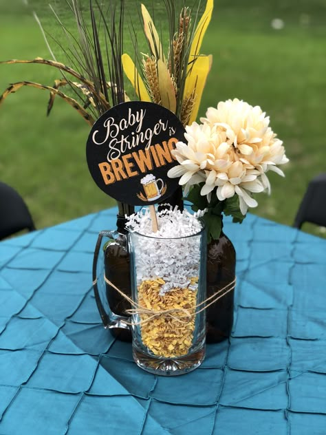 Beer Centerpiece Ideas, Diaper Keg Party Themes, Beer Themed Centerpieces, Beer Bottle Centerpieces For Men, Diapers And Beer Party Ideas, Oktoberfest Baby Shower Ideas, Huggies And Chuggies Party Decor, Diaper Keg Party Decor, Pregger Kegger Decorations