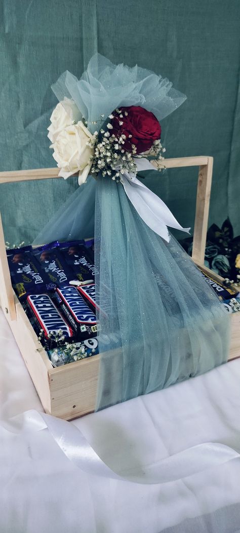 Chocolate hamper wedding Chocolate Tower Hamper Ideas, Chocolate Hampers For Engagement, Chocolate Tray Decoration Wedding, Nikkah Hamper, Hamper Box Design, Chocolate Hamper Ideas Baskets, Wedding Hamper Ideas, Chocolate Hamper Ideas, Chocolate Hamper Ideas Gifts