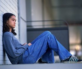 sitting against wall Sitting Against A Wall Drawing Reference, Laying On Wall Pose, Slouched Sitting Pose, Person Writing Pose Reference Drawing, Sitting Leaning Against Wall Pose Reference, Person Sitting On Wall Reference, Sitting Bored Pose Reference, Sitting Back To Back Reference, Person Sitting Photography