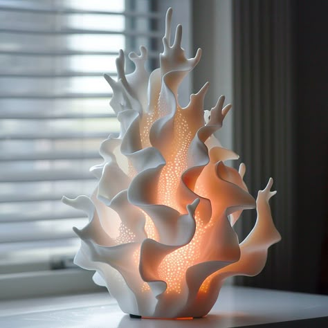 Introducing the “Coral Breeze” lamp: Inspired by the delicate beauty of coral formations, this lamp features a base mimicking the texture and hues of underwater reefs, adding a touch of coastal charm to any space. Conceptual AI Art Follow @ecosapiens for more! Sea Inspired Ceramics, Lamp Product Design, Ceramics Lamp, Sea Lamp, Modern Product Design, Coral Texture, 3d Printed Lamp, Coral Lamp, Lamp Inspired