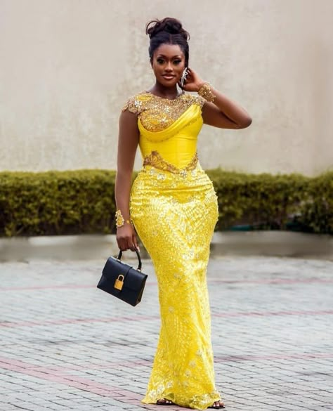 Best and Stunning 2023 Asoebi Gown Styles for Lace. - Ladeey Latest Asoebi Styles Lace 2023, Trending Aso Ebi Lace Styles 2023, Yellow Asoebi Lace Styles, Yellow Lace Asoebi Styles, Asoebi Lace Styles Classy, Lace Gown Styles Nigerian, Asoebi Gown Styles, Nigerian Traditional Dresses, Lace Asoebi Styles