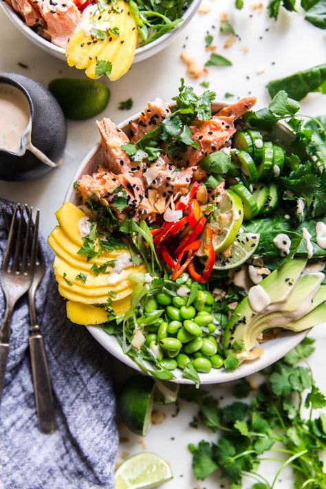 Tender salmon paired perfectly with coconut rice, creamy avocado, mango, cucumber, and a zippy sauce that pulls the whole bowl together. Rice Salmon Bowl, Rice Salmon, Grain Bowl Recipe, Whole Bowl, Recipes Mediterranean, Sommer Mad, Salmon Marinade, Salmon Rice Bowl, The Modern Proper