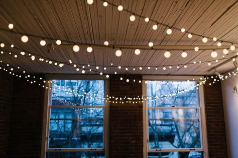 11 Scandinavian Lighting Tricks to Fill Your Home With Hygge | Use string lights to create a festive atmosphere Living Room String Lights, String Lights Living Room, Room String Lights, French Country Bedroom, String Lights In The Bedroom, Scandinavian Lighting, Hanging String Lights, Rectangle Bedroom, String Ball Lights