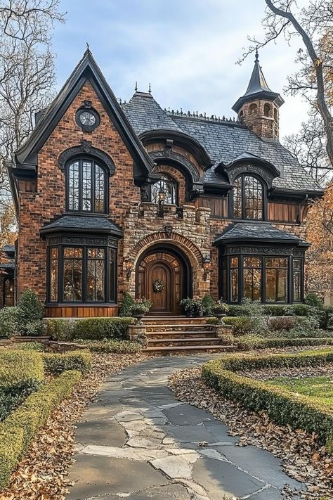 Brick house with arched windows and stone pathway. Ever wondered what it’s like to live in a fairy tale, fireplaces crackling and turrets gleaming, without eating enchanted apples or dodging mischievous dwarves? Tudor Gothic House, Three Story Cottage, Fairytale Home Floor Plans, House Plans With Secret Passages, Small Castle House Design, Gothic Architecture House Exterior, Bridgerton House Layout, Gothic Stone House, Rivendell Inspired Home