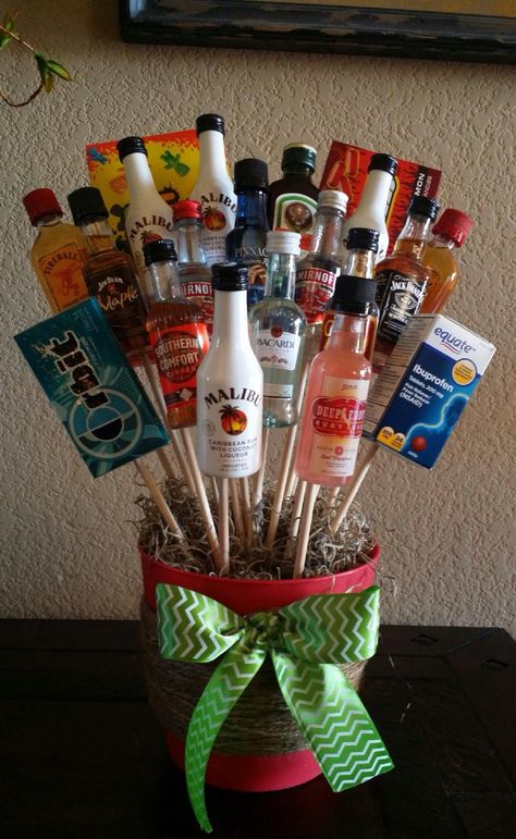 Liquor bouquet for white elephant gift. You can't go wrong. Liquor Bouquet, White Elephant Gift Ideas, Elephant Gift Ideas, Liquor Gifts, Raffle Baskets, White Elephant Gift, Christmas Gift Basket Ideas, Diy Gift Baskets, Alcohol Gifts