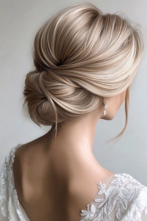 Discover 80+ long bridal hairstyles for a timeless appeal. Perfect for brides who love classic beauty, these styles offer something for every bride. See all the timeless options now! #TimelessBeauty #BridalStyle #LongHairstyles Updo Hair Wedding Bride, Elegant Upstyles Classy Wedding Hairstyles, Timeless Bride Hairstyles, Long Blonde Updo Hairstyles, Chignon Bridal Hair, Wedding Hair For Blondes Brides, Sleek Bride Hairstyles, Polished Wedding Hair, Wedding Hairstyles Updo Elegant Classy