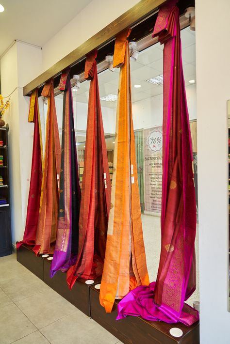 Here's an early morning surprise for y'all! Add that spark you need for your festive wardrobe with these new designer branded sarees exclusively at Safina Plaza! #bangaloreshopping #diwalifest #diwali2018 #womenswear #womensaree #designerlove #safinaplaza #shopaholic #studioY #womeninstyle Fabric Store Design Interior, Saree Display Ideas Showroom, Saree Display Ideas, Saree Display, Saree Showroom, Office Counter Design, Clothing Boutique Interior, Hoarding Design, Showroom Ideas