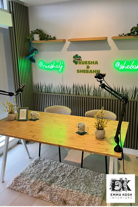 This stunning Studio was designed by Emma Kosh Interiors to host a female football themed Podcast. 
The wallpaper was a hand drawn design specifically for this project. Neon lights were used to signpost insta handles. 
All items needed to be 'removable' so vinyl wallpaper was used plus the panels were Velcroed to the wall. Podcast Set Design At Home, Podcast Wallpapers, Studio Podcast Design, Podcast Backdrop Ideas, Podcast Setup Home, Video Podcast Studio Design Ideas, Podcast Setup Ideas, Video Studio Setup, Podcast Decor