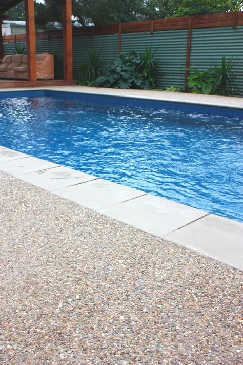 Murray Exposed Aggregate Mix - Poolside  www.mawsons.com Exposed Aggregate Pool, Aggregate Patio, Pool Decking Concrete, Decks Ideas, Pool Paving, Inground Pool Designs, Aggregate Concrete, Pool Landscaping Ideas, Travertine Pool