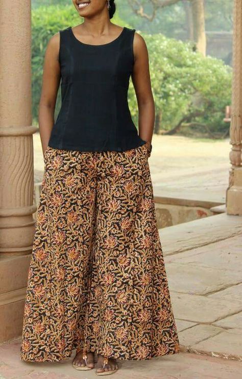 Extra flared palazzo pant Loose Palazzo Pants, Kalamkari Palazzo Pants, Palazo Top Outfits, Top For Palazzo Pants, Top For Palazzo, Plazoo Tops Palazzo Pants, Palazzo Pants And Top Outfit, How To Style Palazzo Pants Casual, Pallazo Outfit Palazzo