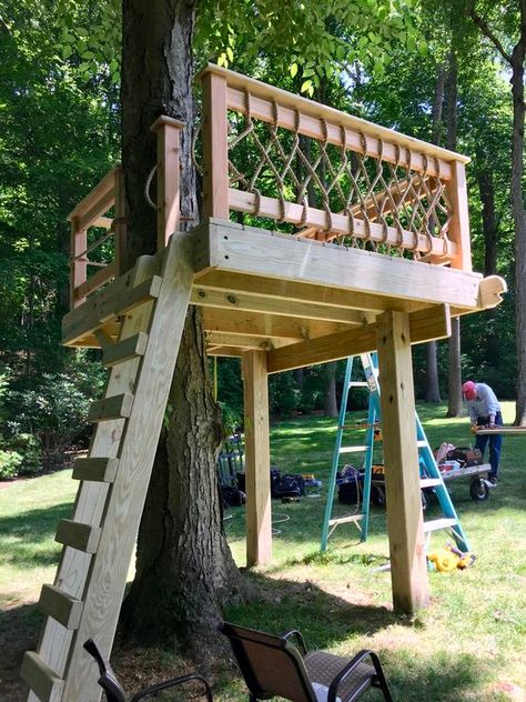 This is another recommendation of a simple tree house that you can build for the kids.  Source: Pinterest (@stilesdesigns.com)  #KidsTreehouseInspiration #CreativeTreehouseDesigns #PlayfulTreehouseIdeas #TreehouseAdventuresForKids #DreamTreehousePlaygrounds #WhimsicalKidsTreehouses #FamilyFunTreehouseProjects #BackyardTreehouseMagic #DIYTreehouseForKids #EnchantingTreehouseHideouts Treehouse Diy Plans Simple, Tree House Platform Diy, 2 Tree Treehouse, Tree House Around Trunk, She Shed Tree House, Two Tree Treehouse, Tree House Plans Diy, Tree House Ideas For Adults, Tree House On Stump