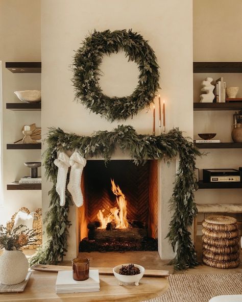 The most magical time of the year 🎄 The essentials for me are twinkling lights, evergreen branches, lots of candles, and Christmas music playing in the background. I rounded up every single item I use to decorate my home for the holidays all in one place. Comment HOLIDAY DECOR and I’ll send the links to your DMs. Organic Modern Christmas Mantle, First Family Christmas, Christmas Garland Mantle, Winter Mantle, Lots Of Candles, Xmas Garland, Leyland Cypress, Holiday Mantle Decor, Mantle Garland