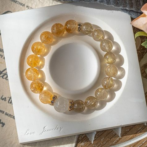 ✨ Elevate your energy with our stunning Citrine and Golden Rutilated Quartz bracelet! 🌟 Known for attracting abundance and amplifying positivity, this radiant duo enhances clarity, boosts motivation, and brings prosperity to your journey. 💛 Embrace the power of these vibrant crystals and let your light shine bright! ✨ Which energy do you want to amplify with this bracelet? #crystal #crystals #crystalhealing #crystallove #crystalshop #crystaljewelry #abundance #citrine #rutilatedquartz #... Attracting Abundance, Golden Rutilated Quartz, Bracelet Crystal, Let Your Light Shine, Quartz Bracelet, Crystal Shop, Rutilated Quartz, Shine Bright, Crystal Jewelry