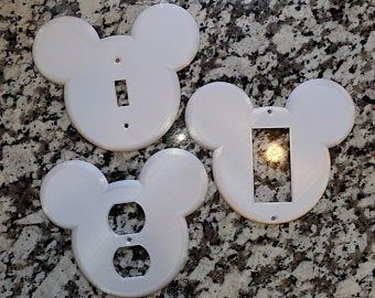 Outlet cover | Etsy Adult Disney Guest Rooms, Disney Light Fixtures, Disney Bedding Subtle, Storage Room Disney Dream Light Valley, Mickey Mouse Bathroom Pottery Barn Kids, Disney Backsplash, Mickey Mouse Bathroom Mirror, Disney Bedroom For Adults, Mickey Mouse Wall Mirror